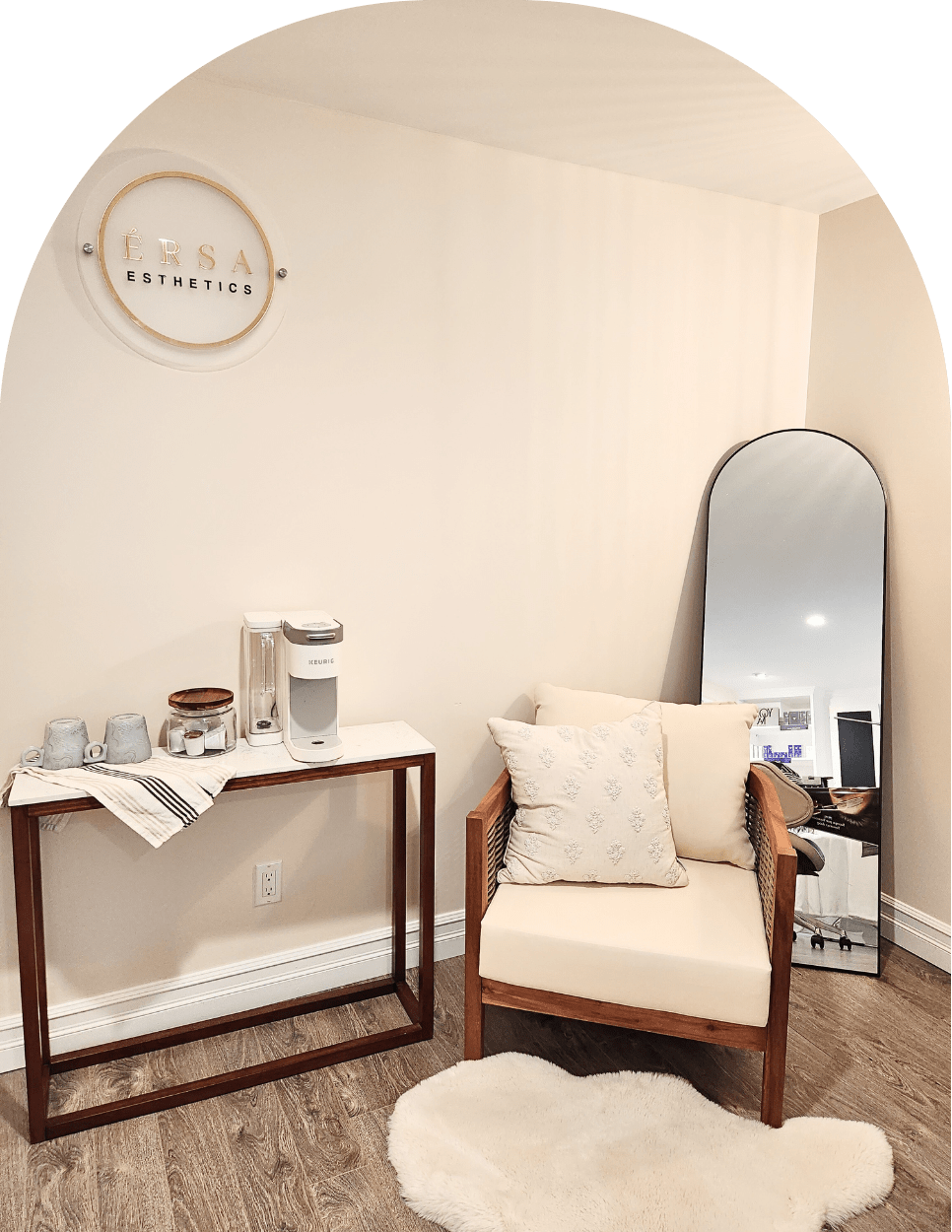 Our waiting area and coffee bar where you can sit down relax and check out your enhanced you in the mirror.
